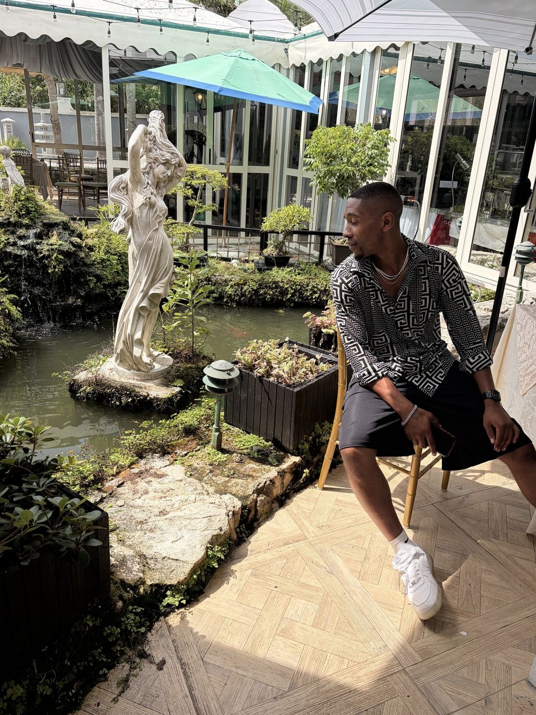 Portrait in a garden courtyard